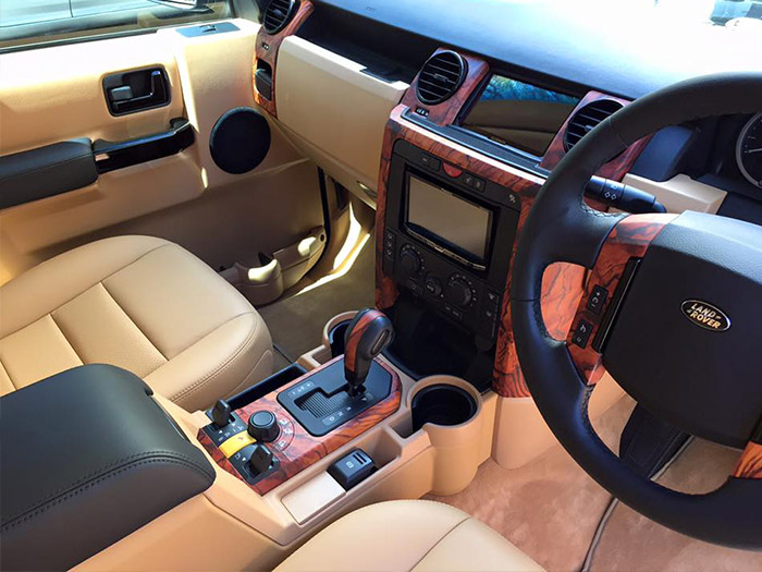 Hydro dipping - wood grain hydro dipped interior dash and trims for Range Rover by Immersion Imaging Brisbane.